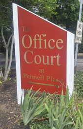 Post & panel sign for a public company