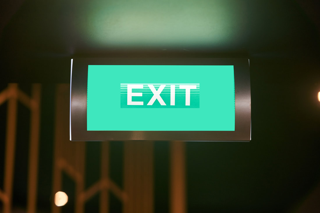 Green exit sign for a hospital in NJ